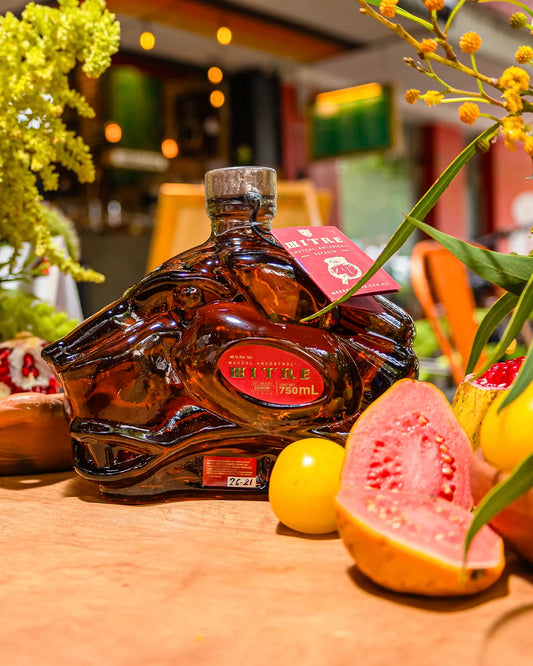 Mezcal Mitre Ancestral paired with fresh fruit for a bold sensory match.